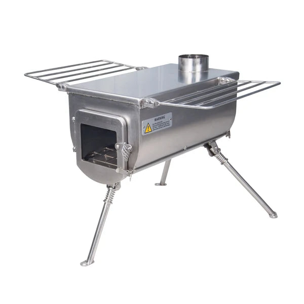 Winnerwell Woodlander Plus External Air vu de biais avec tablettes latérales dépliées et autocollant d'avertissement