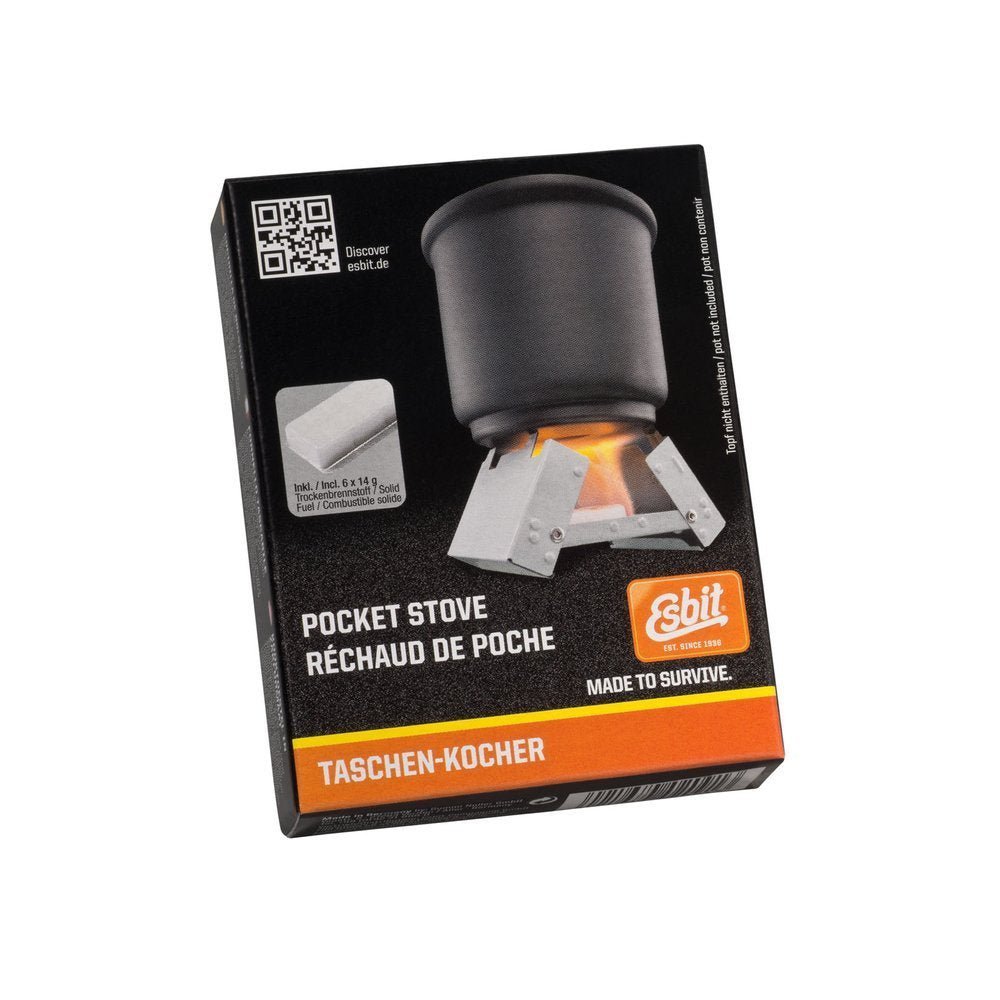 Esbit Survival Stove dans la boîte noire avec une petite casserole sur le réchaud allumé