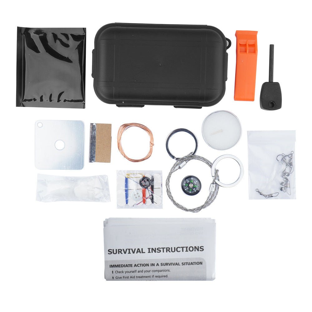 Fosco Combat Survival Kit étalé avec boîte, sifflet, allume-feu, boussole, scie à fil et instructions