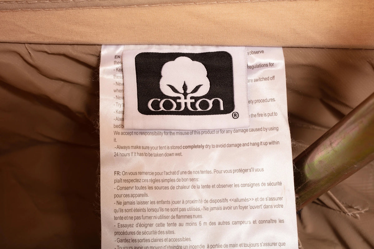 Tipi CanvasCamp Urban Traveller 450, étiquette avec le logo cotton et les instructions d'utilisation