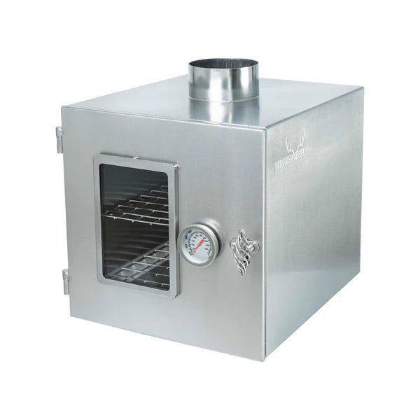 Four Winnerwell pour tuyau de poêle avec grilles derrière la petite porte vitrée et raccord de tuyau en haut