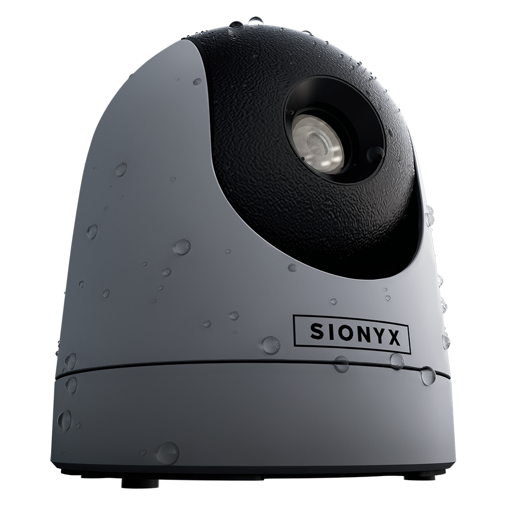 Caméra SiOnyx Nightwave grise avec gouttes d'eau sur le boîtier et l'objectif