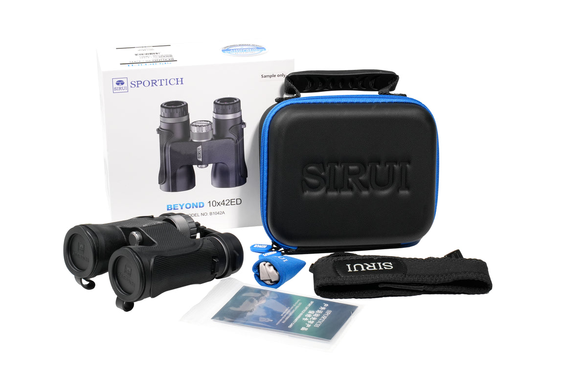 Jumelles Sirui Sportich avec boîte, étui rigide zippé, sangle de transport et chiffon pour lentilles