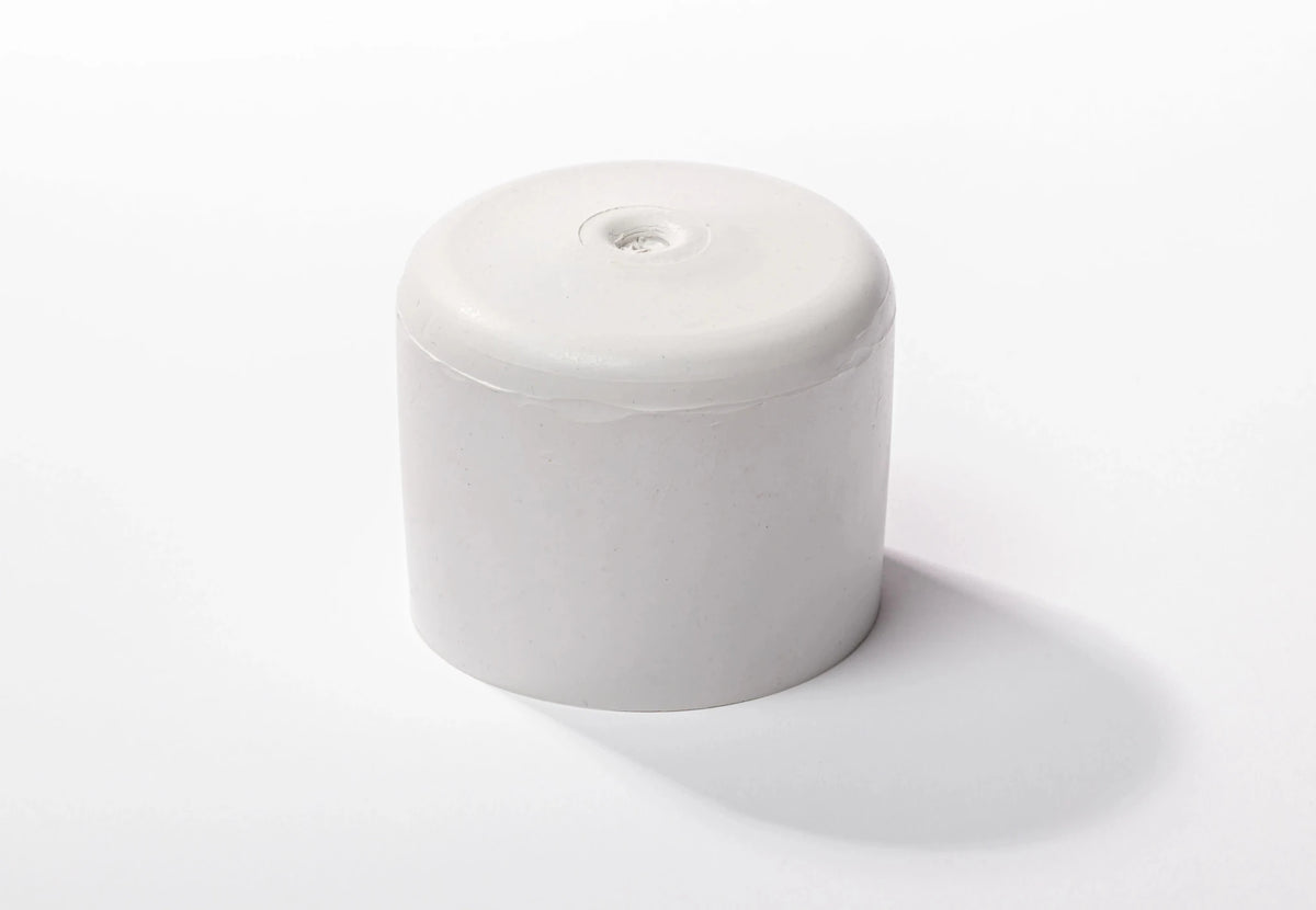 Jeu de mâts aluminium CanvasCamp, un embout rond blanc avec un petit trou sur le dessus