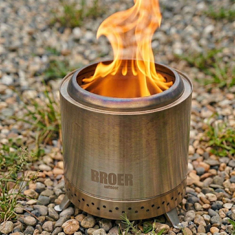 Broer Outdoor Vortex de près avec de hautes flammes au-dessus du bord, sur du gravier