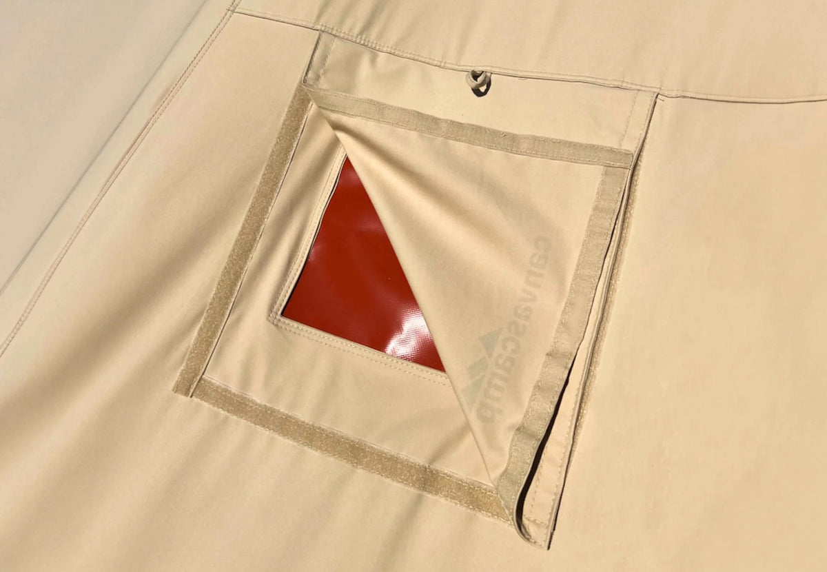 Passe-tuyau CanvasCamp DIY intégré dans la toile de tente, avec un coin replié