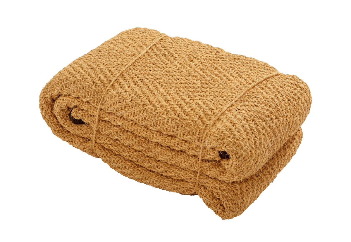 Tapis coco demi-rond CanvasCamp plié et attaché avec une corde