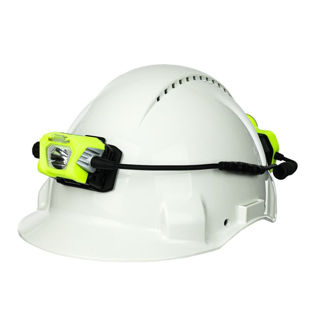 Lampe frontale Mactronic Ultimo X1000 montée sur un casque de sécurité blanc