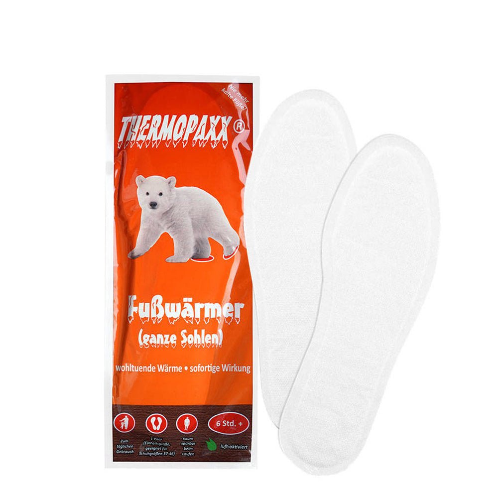 Thermopaxx chauffe-pieds, emballage orange avec ours polaire et deux semelles chauffantes blanches
