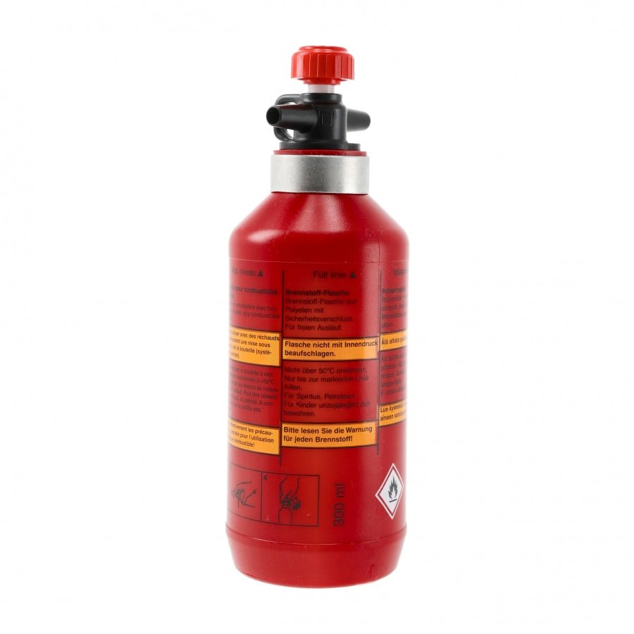 Bouteille à combustible Trangia de l'autre côté avec étiquette d'avertissement et bouchon verseur