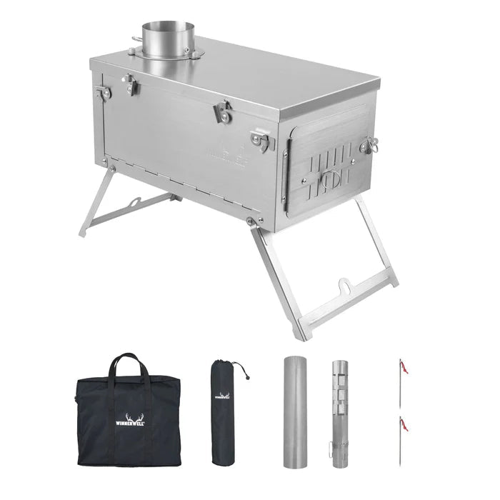 Poêle Winnerwell Fastfold Titanium avec pieds dépliés au-dessus des sacs et tuyaux fournis